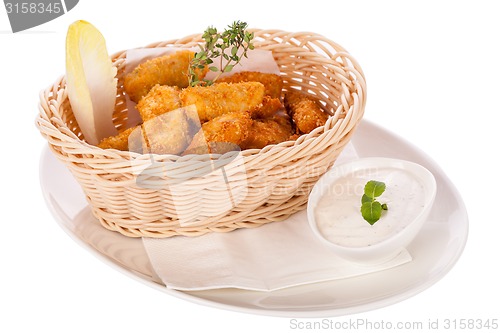 Image of Crumbed chicken nuggets in a basket