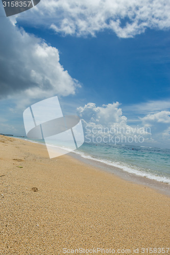 Image of Beautiful tropical beach with lush vegetation