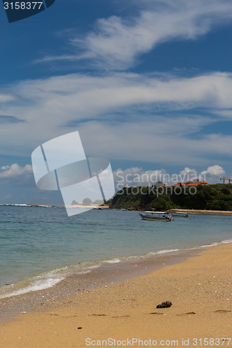 Image of Beautiful tropical beach with lush vegetation