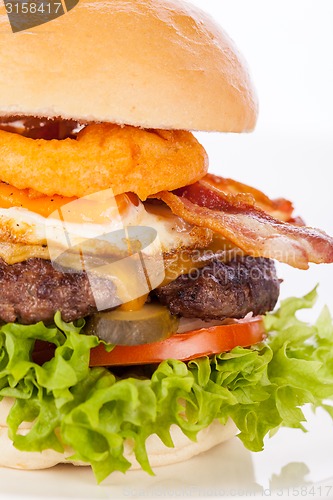 Image of Delicious egg and bacon cheeseburger