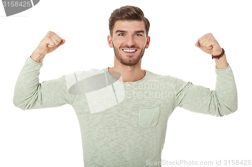 Image of young man in casual fashion on white