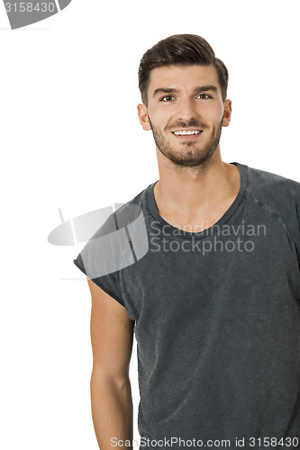 Image of Handsome bearded young man with a lovely smile