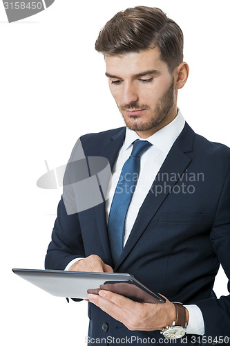 Image of Businessman using a tablet computer