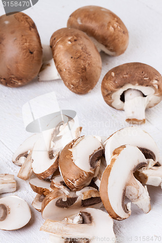 Image of Diced and whole agaricus brown button mushrooms