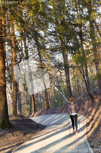 Image of Woman hiking in nature. 