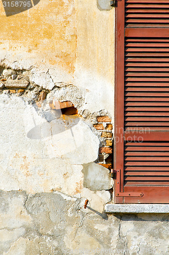 Image of red window  varano   abstract  sunny day   in the concrete  bric