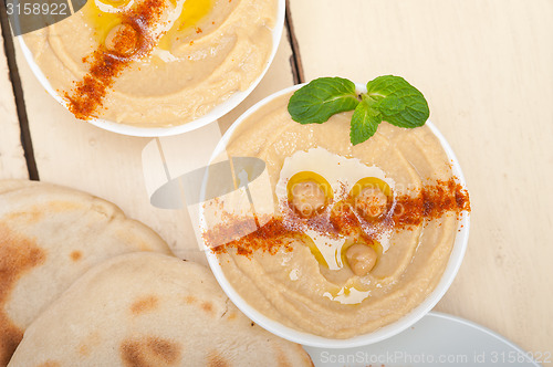 Image of Hummus with pita bread 