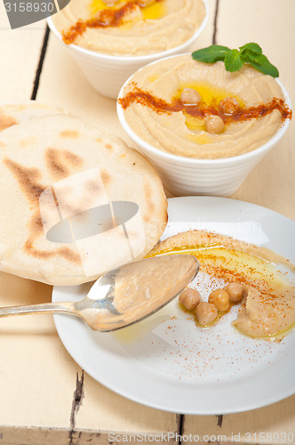 Image of Hummus with pita bread 