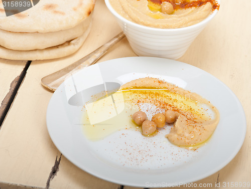 Image of Hummus with pita bread 