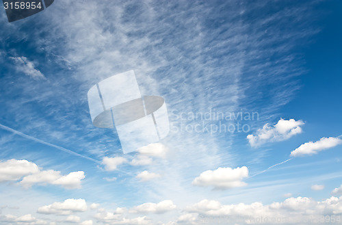 Image of Cirrus and cumulus clouds in the blue sky.