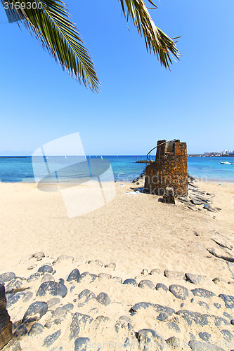 Image of white coast lanzarote  in  tower  stone water  and  