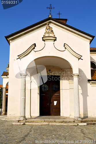 Image of  church  in  the mozzate      closed brick tower sidewalk italy 