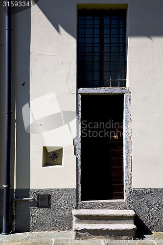 Image of brown door  europe    lombardy       in  the milano  closed bric