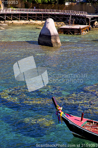 Image of  blue lagoon  stone in thailand kho tao bay abstract of a pier b