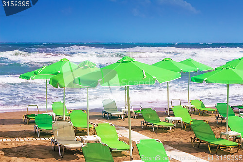 Image of Empty beach in the sea during a storm.