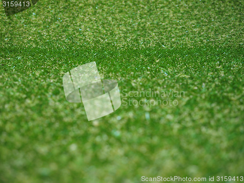 Image of Green artificial synthetic grass meadow background