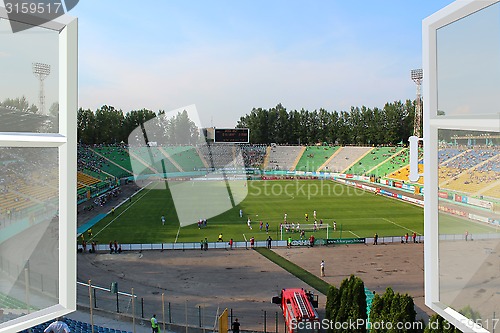 Image of opened window to the stadium