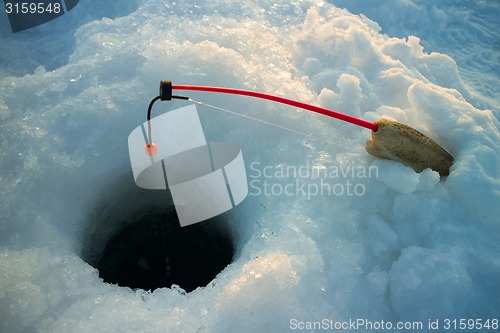 Image of ice fishing  handmade fishing rod