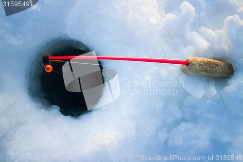 Image of ice fishing  handmade fishing rod
