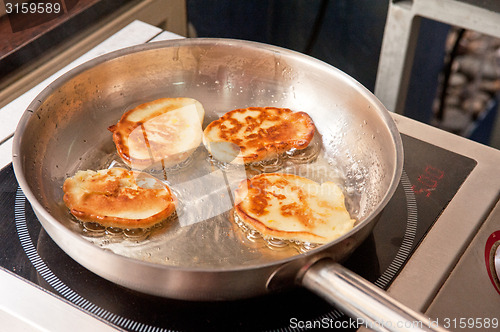 Image of Cooking corn pancakes