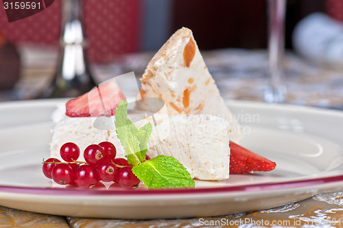 Image of cream berries dessert