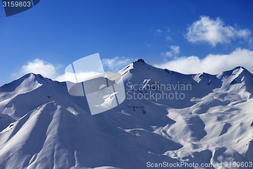 Image of Snowy sunlight mountains