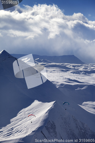 Image of Speed flying in winter mountains