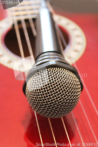 Image of guitar and microphone