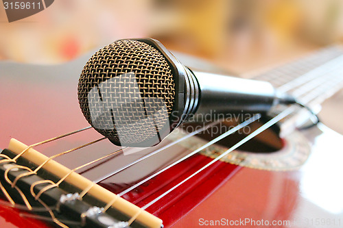 Image of guitar and microphone