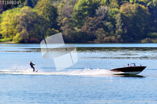 Image of boat with water skier