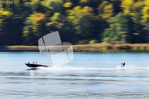 Image of boat with water skier