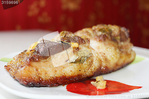 Image of baked piece of meat on the plate