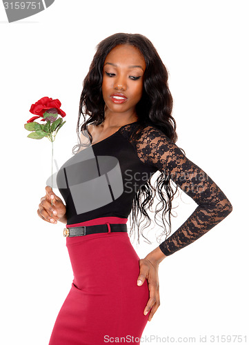 Image of Black woman with rose.