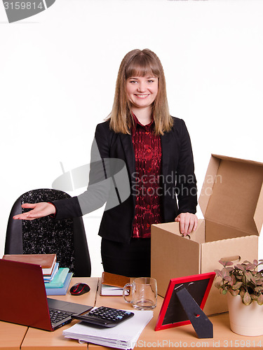 Image of Girl in the office gets a new workplace