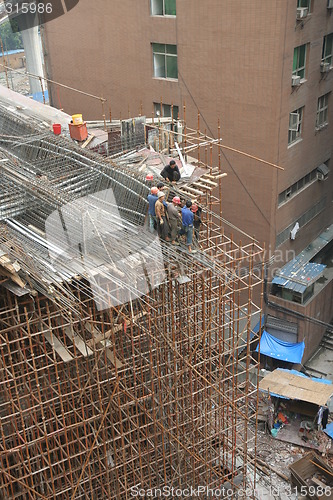 Image of People building highway