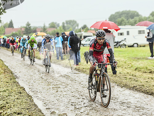 Image of The Cyclist John Darwin Atapuma on a Cobbled Road - Tour de Fran