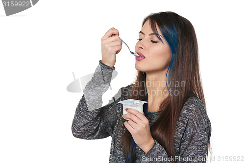 Image of Healthy woman eating yoghurt