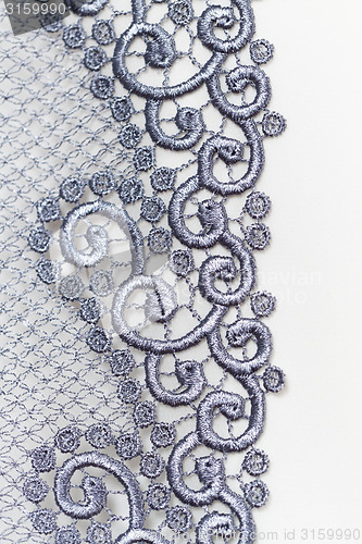 Image of Decorative silver lace