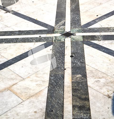 Image of brick in busto arsizio street l  pavement of a curch and marble