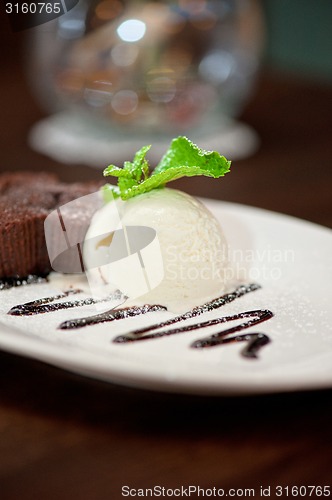 Image of chocolate cake with ice cream