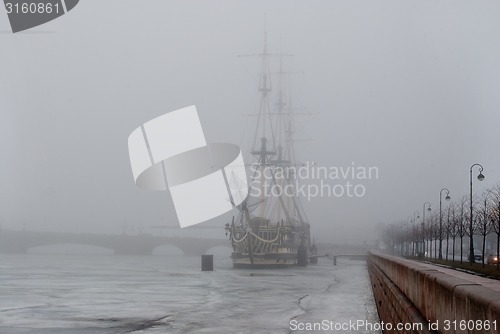 Image of Sailboat in the fog.