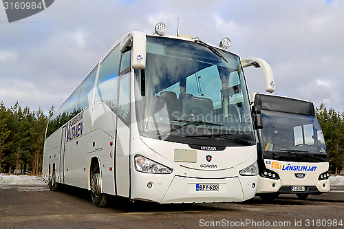 Image of White Scania Irizar and VDL Citea Buses Parked