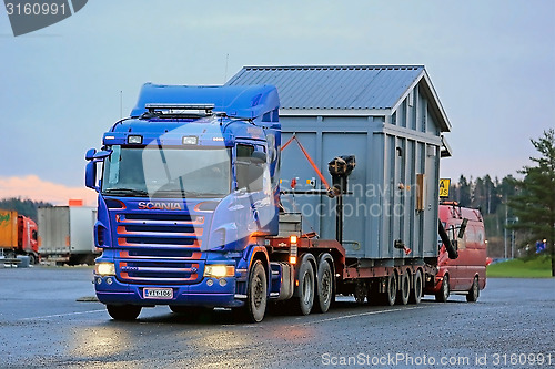 Image of Scania R500 Hauls an Exceptional Load at Dusktime