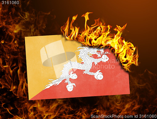 Image of Flag burning - Bhutan