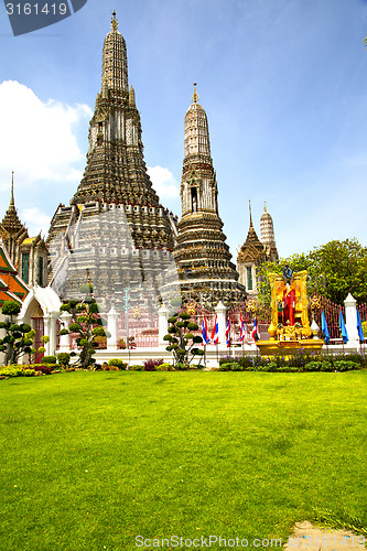 Image of gold    temple   in   bangkok  thailand grass