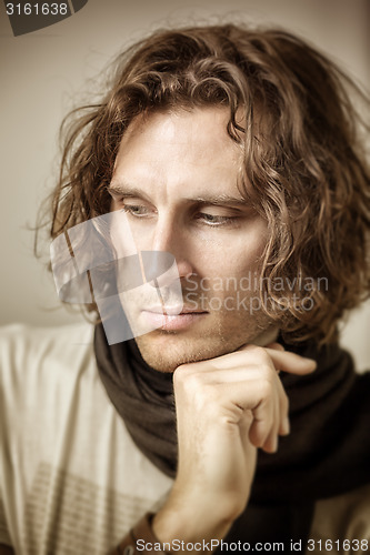 Image of young man curly hair