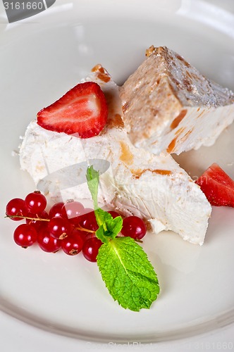 Image of cream berries dessert