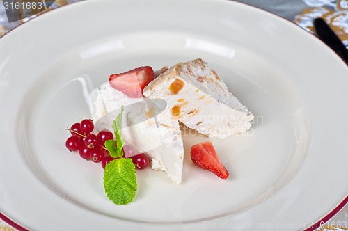 Image of cream berries dessert
