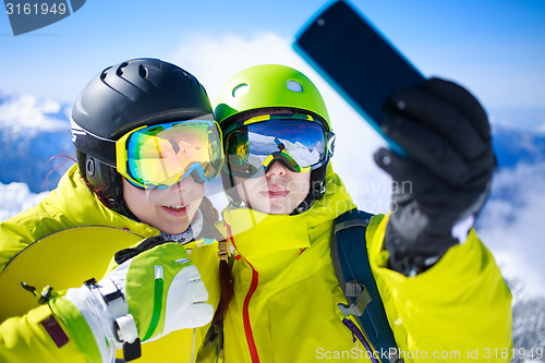 Image of Young couple taking a selfie