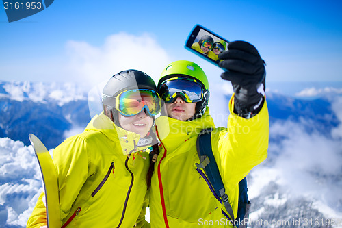 Image of Young couple taking a selfie